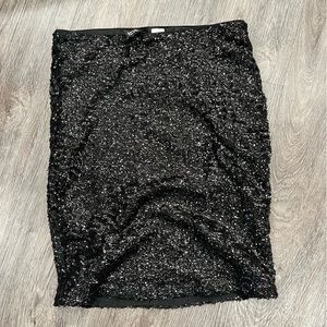 Women’s Divided XS black sequin stretch skirt in great condition.